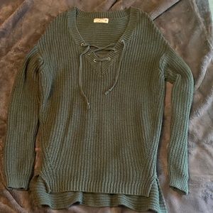 Dark green ruff hewn long sleeve sweater. 55% cotton, 45% acrylic